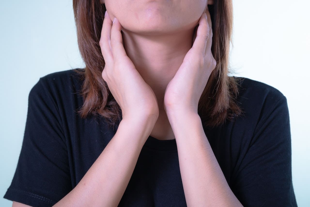 Woman experiencing oral pain