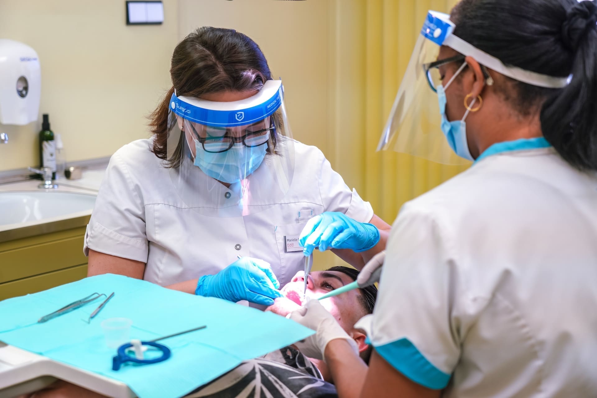 Patient undergoing dental implant surgery