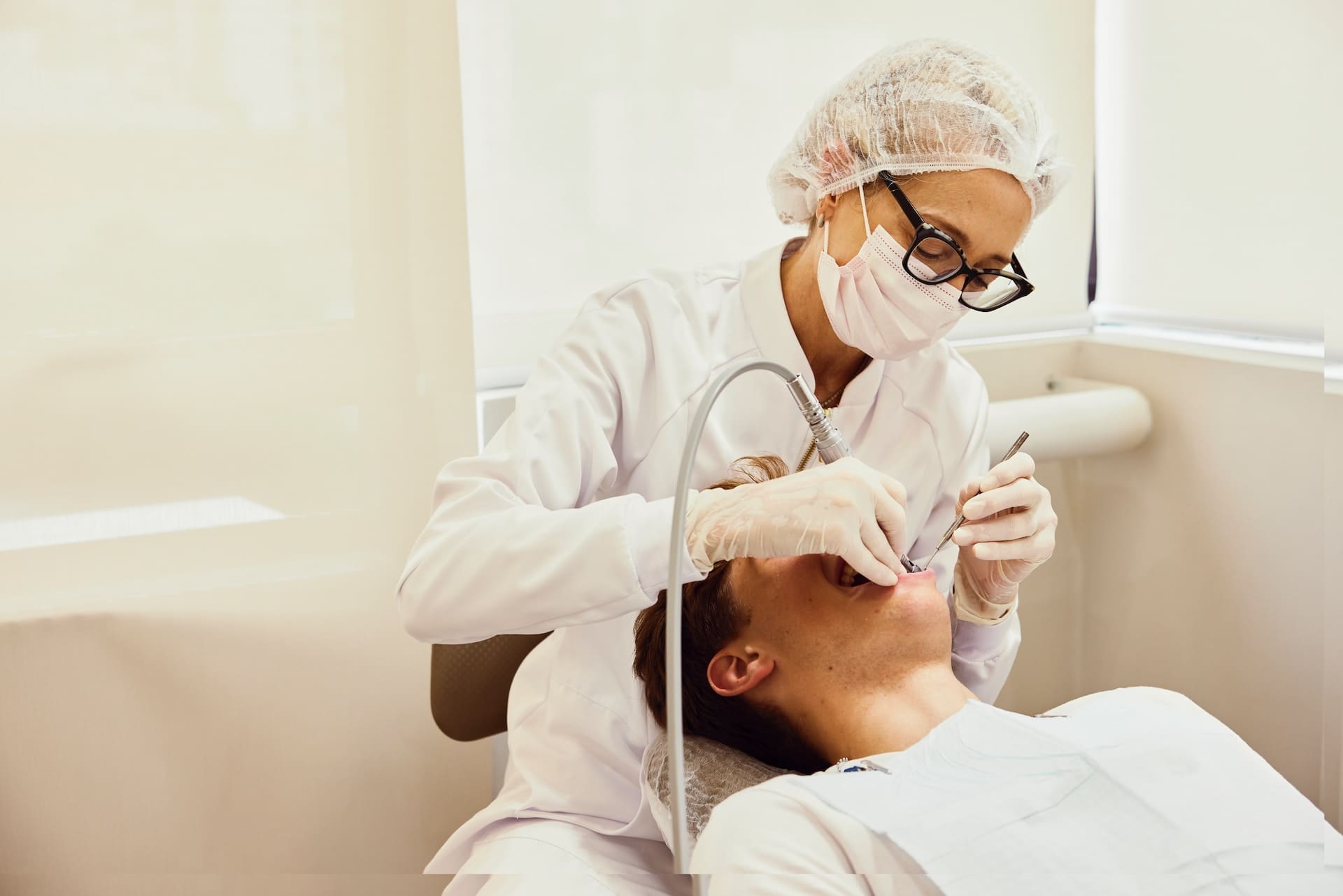 Patient undergoing dental implant surgery